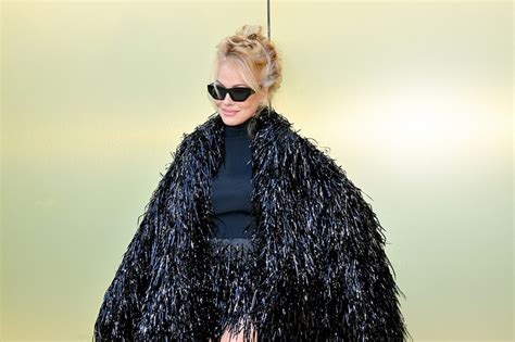 Pamela Anderson Holds Court in Dramatic Coat at .